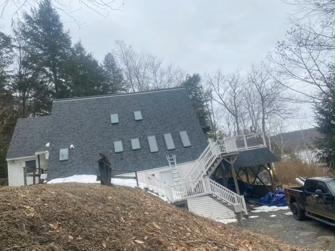 Roof inspection in progress in New Hampshire
