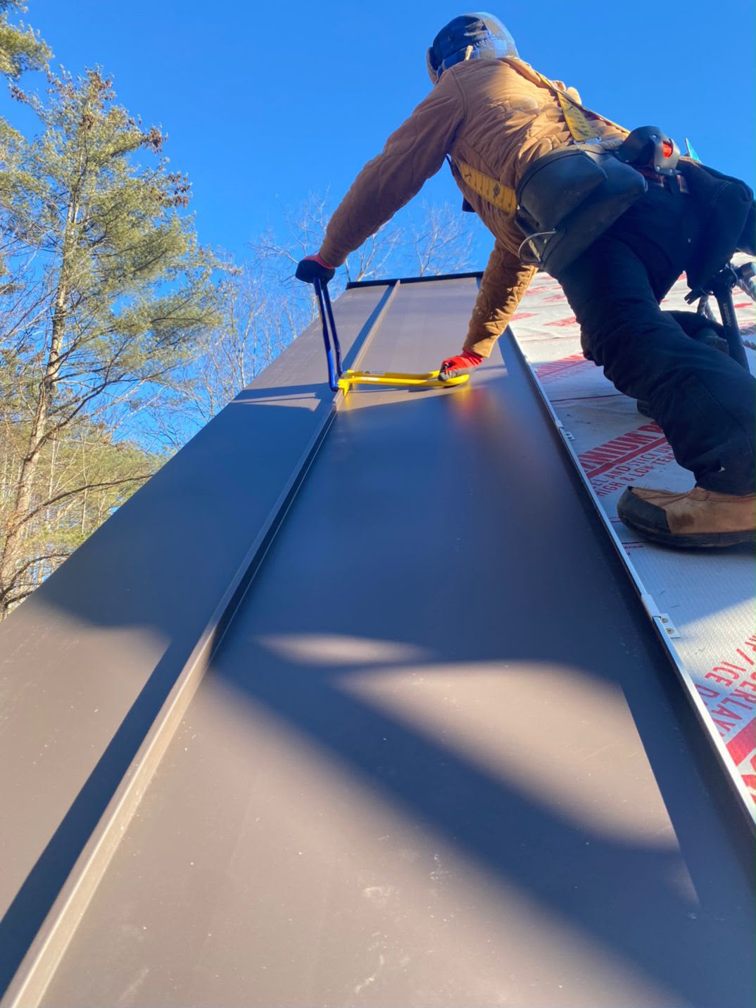 Metal roof panel finished in New Hampshire